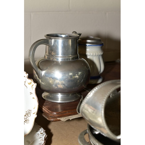 669 - A COLLECTION OF PEWTER, including baskets, plates, comports, tumblers, pitchers, tea caddy and cover... 