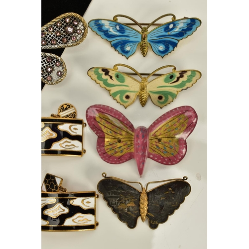 67 - A COLLECTION OF BUTTERFLY BROOCHES AND A BRACELET, to include ten butterfly brooches of various desi... 