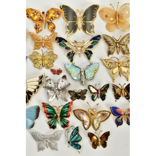 68 - A QUANTITY OF BUTTERFLY BROOCHES, to include yellow and white metal brooches of various designs such... 