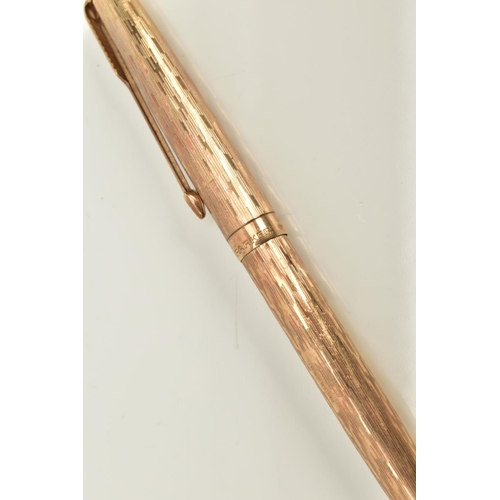 69 - A 9CT GOLD BALL POINT PARKER PEN, of engine turn design, hallmarked 9ct gold London, approximate wei... 