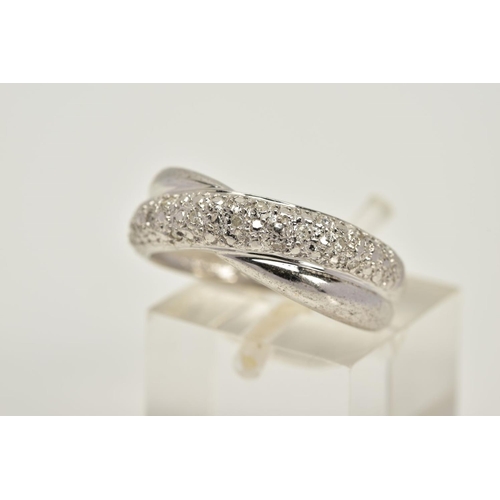 70 - A WHITE METAL DIAMOND RING, of crossover design, set with a row of single cut diamonds, plain polish... 