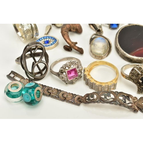 82 - A SELECTION OF JEWELLERY, to include seven pendants such as a rectangular St.Christopher pendant, a ... 