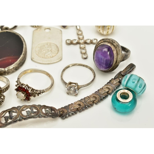 82 - A SELECTION OF JEWELLERY, to include seven pendants such as a rectangular St.Christopher pendant, a ... 