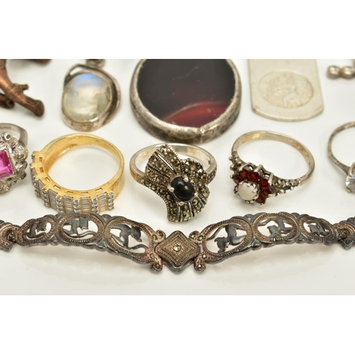 82 - A SELECTION OF JEWELLERY, to include seven pendants such as a rectangular St.Christopher pendant, a ... 