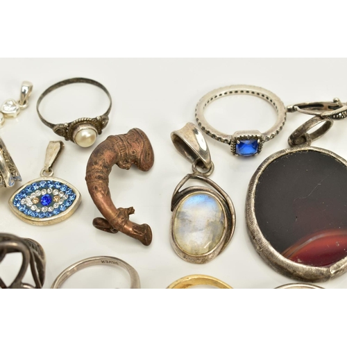 82 - A SELECTION OF JEWELLERY, to include seven pendants such as a rectangular St.Christopher pendant, a ... 