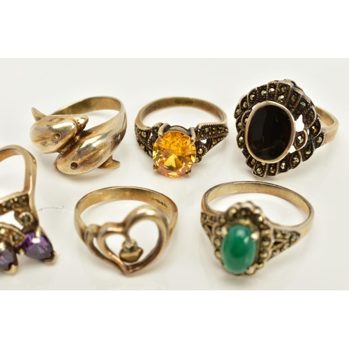 83 - A SELECTION OF SIX RINGS, to include an onyx and marcasite cluster ring, Sheffield import mark, ring... 