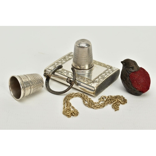 88 - A SMALL QUANTITY OF ITEMS, to include two silver thimbles, one with a Birmingham hallmark, a white m... 