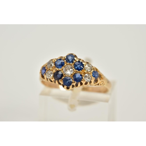 61 - AN EARLY TWENTIETH CENTURY SAPPHIRE AND DIAMOND RING, designed as a lozenge shaped cluster set with ... 