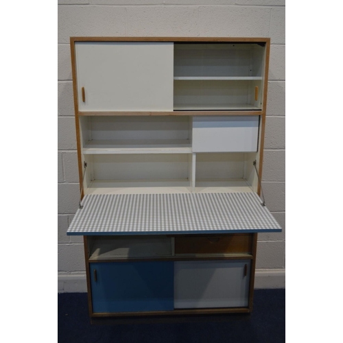 1354 - FRANK GUILLE FOR KANDYA KITCHEN CABINETS, white and light blue painted wood, with a central fall fro... 