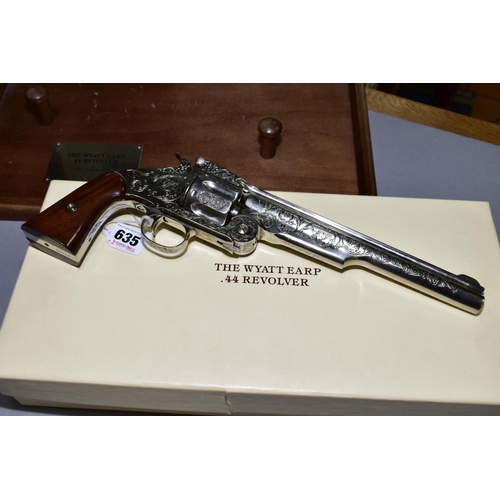 A BOXED FRANKLIN MINT WYATT EARP .44 REVOLVER, on a wooden