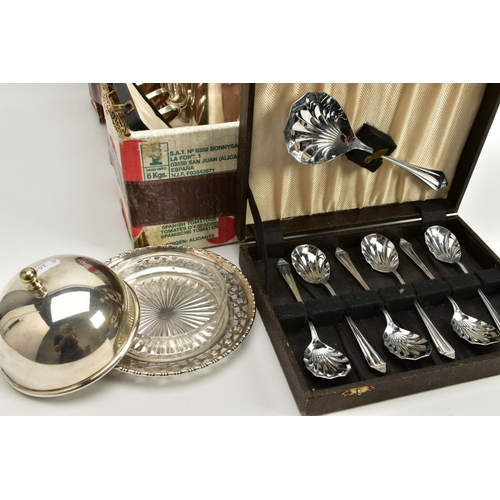 105 - A SELECTION OF WHITE METALWARE, to include an EP circular tray, a wavy edge raised silver plate tray... 