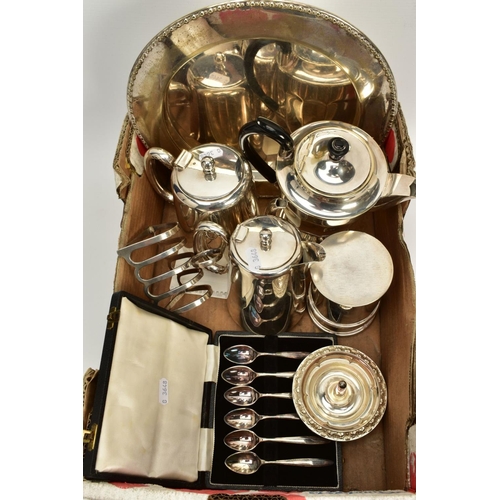 105 - A SELECTION OF WHITE METALWARE, to include an EP circular tray, a wavy edge raised silver plate tray... 