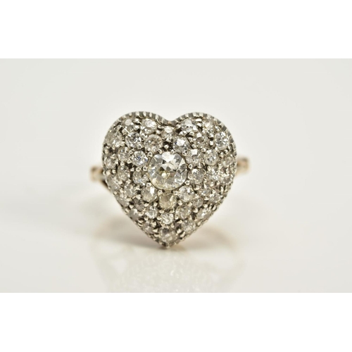 115 - A GOLD LATE VICTORIAN PAVE HEART, with graduated old Swiss and circular cut diamonds, originally des... 