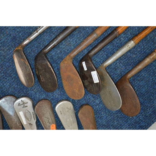 1292 - A LARGE COLLECTION OF VINTAGE HICKORY SHAFTED GOLF CLUBS, to include mainly irons, putters, woods, t... 