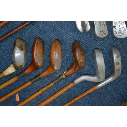 1292 - A LARGE COLLECTION OF VINTAGE HICKORY SHAFTED GOLF CLUBS, to include mainly irons, putters, woods, t... 