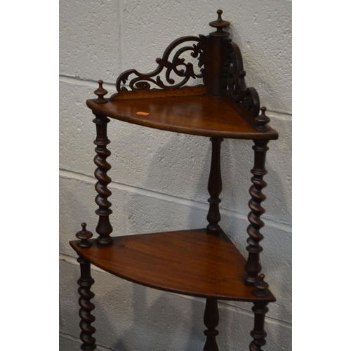 1294 - A VICTORIAN WALNUT BARLEY TWIST FOUR TIER CORNER WHAT- NOT, with a foliate gallery, height 127cm tog... 