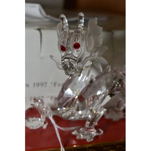 335 - A BOXED SWAROVSKI CRYSTAL ANNUAL EDITION 1997, 'Fabulous Creatures - The Dragon' with boxed stand, o... 