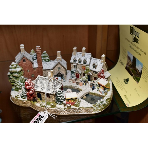 358 - A BOXED LIMITED EDITION ILLUMINATED LILLIPUT LANE SCULPTURE, L2950 'Christmas Fayre' No 0663, with c... 