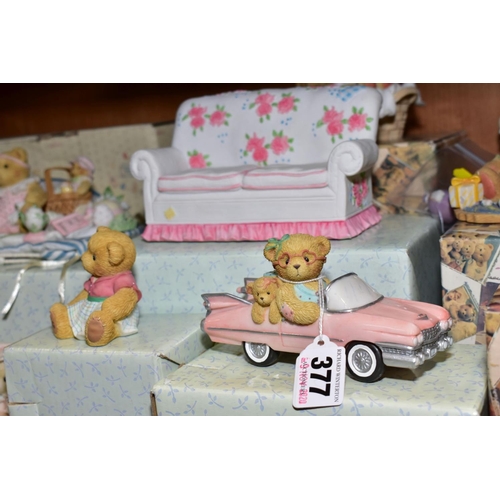 377 - A GROUP OF CHERISHED TEDDIES, to include a nursery rhyme stand, nine with boxes, 'Evelyn', 'Janet', ... 