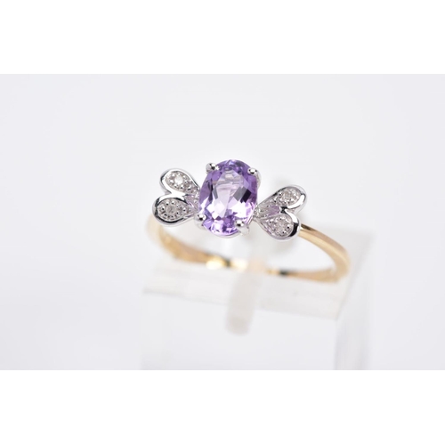 38 - A 9CT GOLD AMETHYST AND DIAMOND RING, designed with a claw set, oval cut amethyst, with heart shaped... 