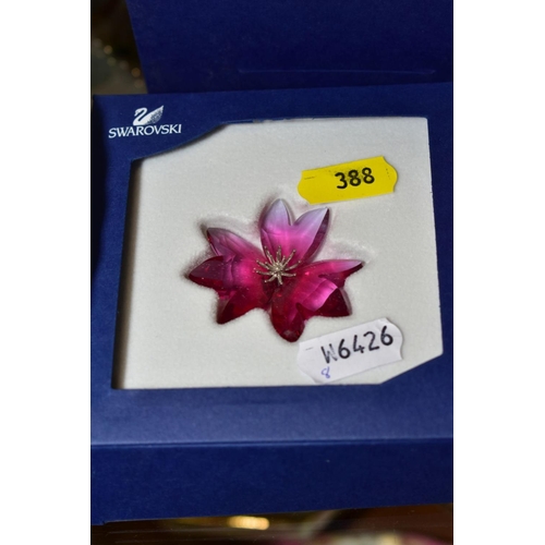 388 - A BOXED SWAROVSKI CRYSTAL PARADISE BUTTERFLY, AMARA FUCHSIA RAIN, with paperwork height 9cm 619371, ... 