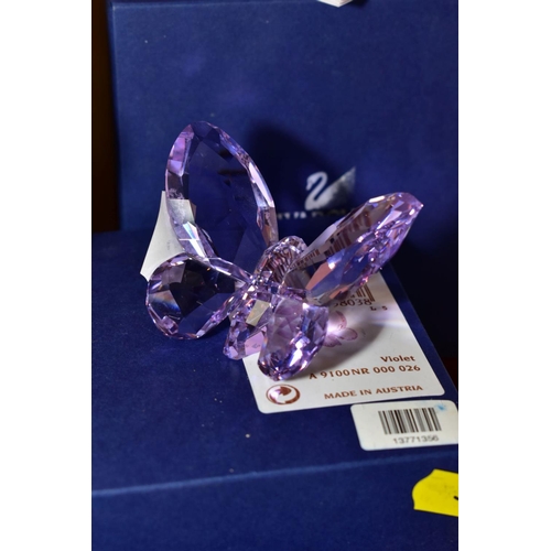 388 - A BOXED SWAROVSKI CRYSTAL PARADISE BUTTERFLY, AMARA FUCHSIA RAIN, with paperwork height 9cm 619371, ... 