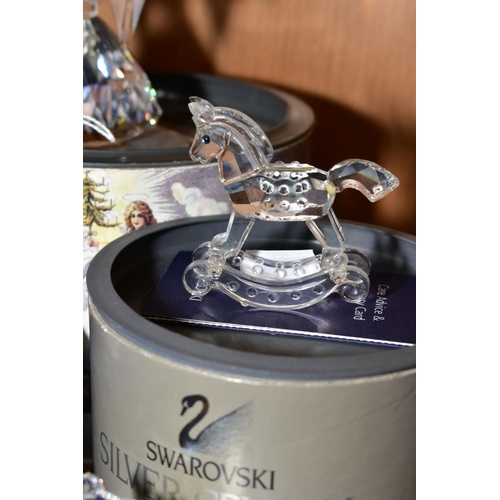 400 - A BOXED SWAROVSKI CRYSTAL CHRISTMAS ANGEL, 194761, height 9.5cm, together with a boxed Rocking Horse... 