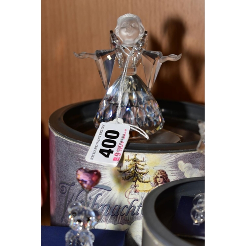 400 - A BOXED SWAROVSKI CRYSTAL CHRISTMAS ANGEL, 194761, height 9.5cm, together with a boxed Rocking Horse... 