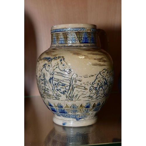 409 - HANNAH BOLTON BARLOW (1851-1916), a Doulton Lambeth stoneware jug, incised with horses and sheep, im... 