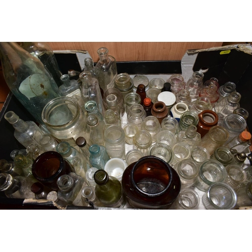 427 - TWO BOXES OF VINTAGE GLASS BOTTLES AND JARS, including a small quantity of stoneware items, some exa... 