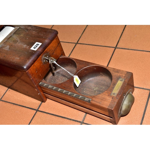 428 - A LATE VICTORIAN WALNUT TILL OF RECTANGULAR FORM, with key, the drawer with four dished coin compart... 