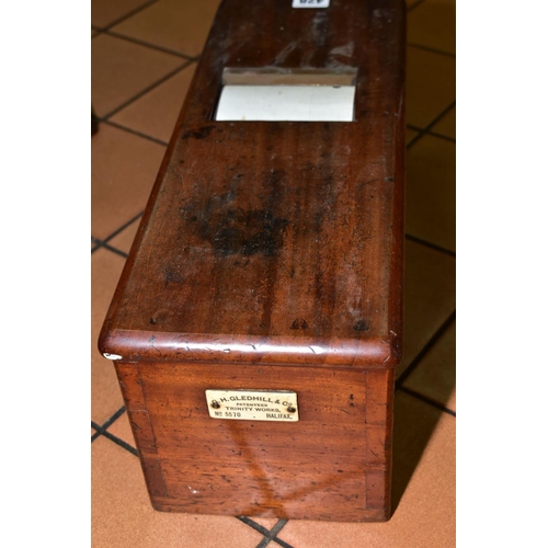 428 - A LATE VICTORIAN WALNUT TILL OF RECTANGULAR FORM, with key, the drawer with four dished coin compart... 