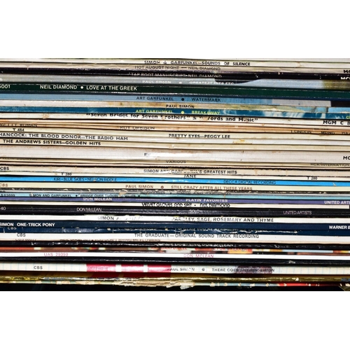 497 - TWO TRAYS CONTAINING OVER ONE HUNDRED AND THIRTY LPS from artists such as Elvis Presley, Buddy Holly... 