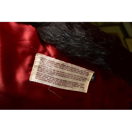 520 - A LADIES FRENCH RABBIT FUR COAT, bears size 16 tag to acetate lined interior, together with a black ... 