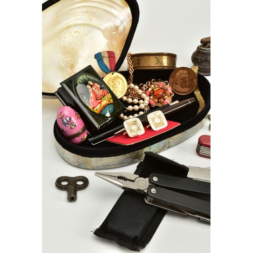 58 - A SELECTION OF MISCELLANEOUS ITEMS, to include a mother of pearl shell jewellery box and contents su... 