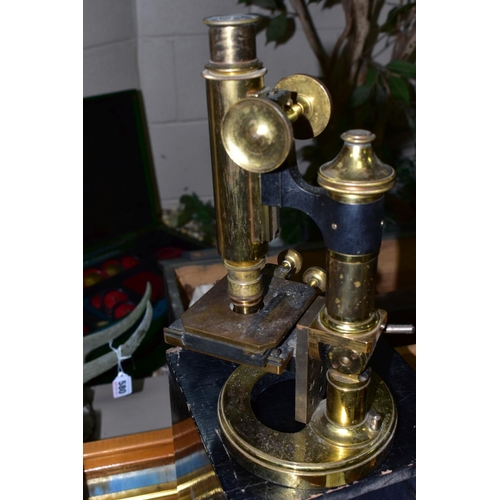 583 - A ROSS ECLIPSE METALLURGITAL MICROSCOPE, No.6068 of brass construction with some scratches and tarni... 