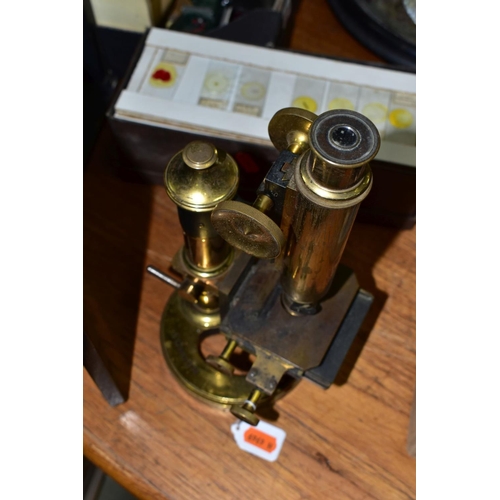 583 - A ROSS ECLIPSE METALLURGITAL MICROSCOPE, No.6068 of brass construction with some scratches and tarni... 