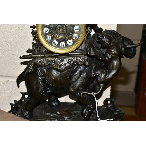 596 - A LATE 19TH CENTURY BRONZED METAL MANTEL CLOCK, the ornate case modelled as an Indian elephant with ... 