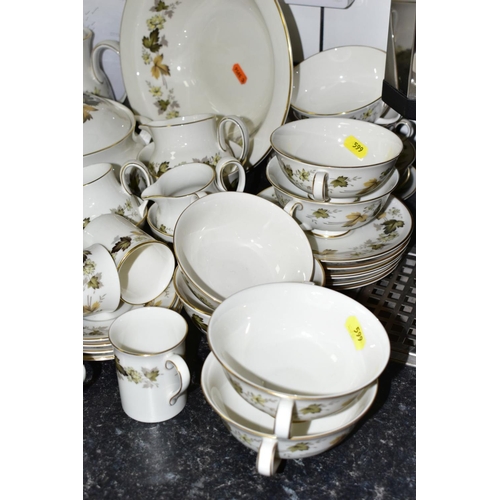 599 - A ROYAL DOULTON 'LARCHMONT' DINNER SERVICE to include tureens, tea and coffee pots, twin handled sou... 