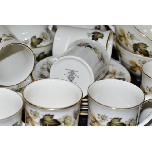 599 - A ROYAL DOULTON 'LARCHMONT' DINNER SERVICE to include tureens, tea and coffee pots, twin handled sou... 