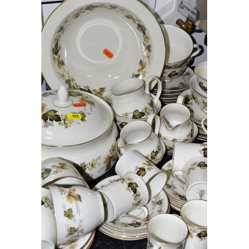 599 - A ROYAL DOULTON 'LARCHMONT' DINNER SERVICE to include tureens, tea and coffee pots, twin handled sou... 