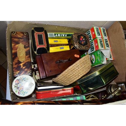 653 - FIVE BOXES AND LOOSE BOOKS, METALWARES, TREEN, etc, including a brown leather effect suitcase, a bro... 