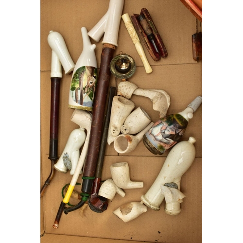 83 - A SELECTION OF SMOKING EQUIPMENT, to include a cased Meerschaum pipe, the bowl gripped by a clawed b... 