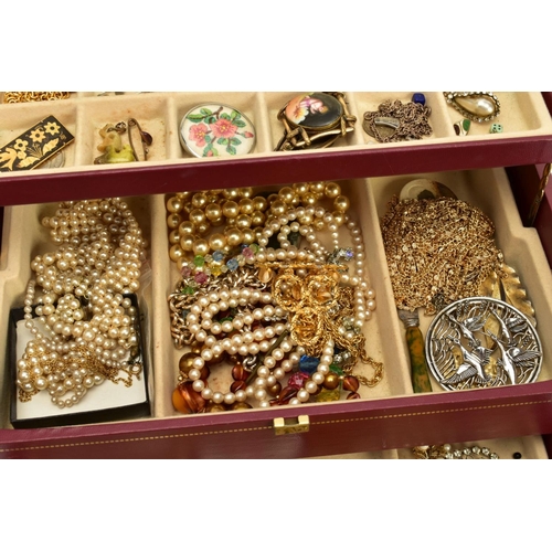 96 - A JEWELLERY BOX WITH COSTUME JEWELLERY, the three tiered burgundy and gold trim jewellery box opens ... 