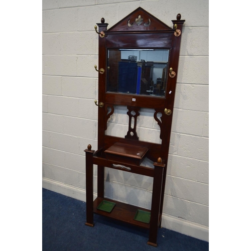 1326 - AN EARLY 20TH CENTURY MAHOGANY HALL STAND, with six brass hooks, central bevelled edge mirror, width... 