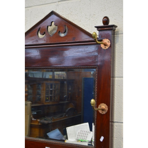 1326 - AN EARLY 20TH CENTURY MAHOGANY HALL STAND, with six brass hooks, central bevelled edge mirror, width... 