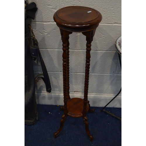 1331 - A CIRCULAR WROUGHT IRON PLANT STAND BASE, with a later ceramic wash basin, height 80cm together with... 