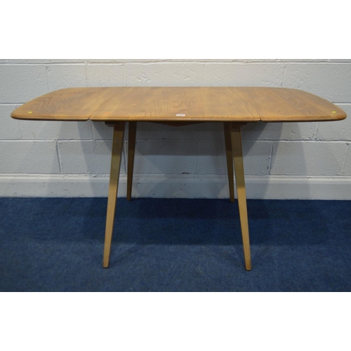 1333 - AN ERCOL MODEL 383 BLONDE ELM AND BEECH DROP LEAF DINING TABLE, on square out splayed tapering legs,... 