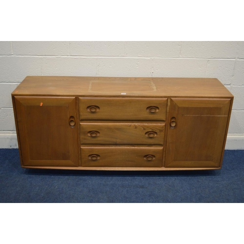 1334 - AN ERCOL WINDSOR MODEL 455 BLONDE ELM SIDEBOARD, three central drawers, the top drawer with a separa... 