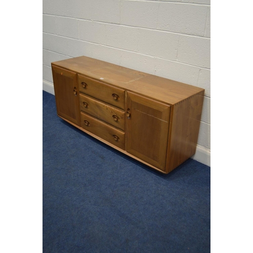 1334 - AN ERCOL WINDSOR MODEL 455 BLONDE ELM SIDEBOARD, three central drawers, the top drawer with a separa... 